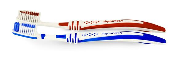 Two toothbrushes AQUAFRESH on white background photo