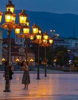 North Macedonia, Skopje 12 July 2021- The young girl is photographed on a smartphone in the center on a square in Skopje. Selective focus photo