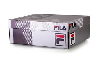 KAMCHATKA, RUSSIA - JANUARY 16, 2023-  Box Fila shoe isolated on white background, Fila is one of the most famous brands in the world photo
