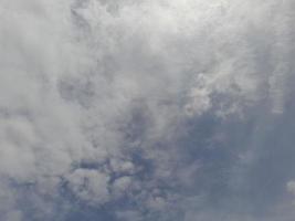 Dark sky with clouds during the day on Lombok island, Indonesia photo