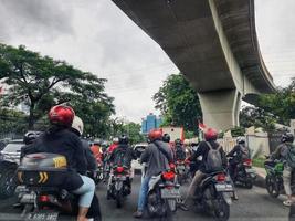 Jakarta, Indonesia in July 2022. There is a traffic jam under the Becakayu Toll Road photo