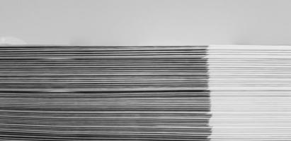 Close up pattern and line of white and black spine or saddle book are sorting and stacking for background with above space. Art group of object, Education and Library concept photo