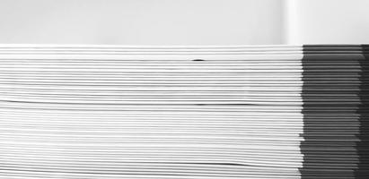 Close up pattern and line of white and black spine or saddle book are sorting and stacking for background with above space. Art group of object, Education and Library concept photo