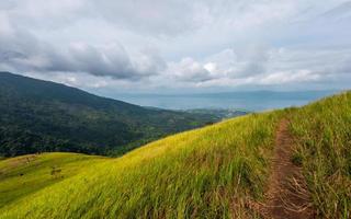 Mountain landscape with meadow. Highland in West Sumatra. Indonesia photo