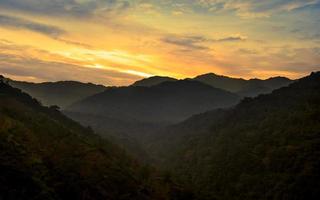 Beautiful mountain sunset landscape in West Sumatra. Indonesia photo