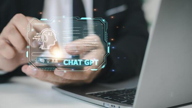 ChatGPT Chat with AI or Artificial Intelligence. Business chatting with a smart AI or artificial intelligence using an artificial intelligence chatbot developed by OpenAI. photo