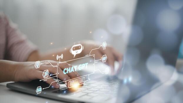 ChatGPT Chat with AI or Artificial Intelligence. Business chatting with a smart AI or artificial intelligence using an artificial intelligence chatbot developed by OpenAI. photo