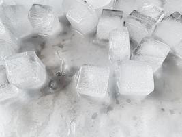 Ice cubes background, ice cube texture or background It makes me feel fresh and feel good, In the summer, ice and cold drinks will make us feel relaxed, Made for beverage or refreshment business. photo