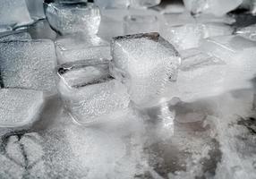 Ice cubes background, ice cube texture or background It makes me feel fresh and feel good, In the summer, ice and cold drinks will make us feel relaxed, Made for beverage or refreshment business. photo