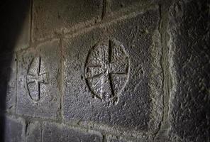 Templar cross in a stone photo
