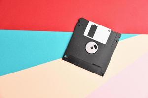 Floppy disk on colorful background photo