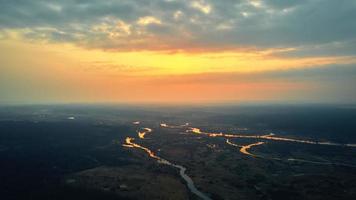 Sunrise over river. Aerial view photo