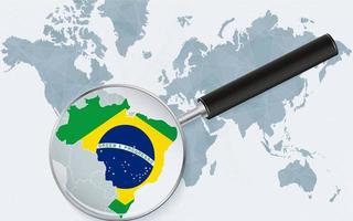 World map with a magnifying glass pointing at Brazil. Map of Brazil with the flag in the loop. vector