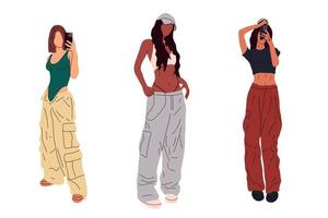 Set of three Beautiful young women in a fashionable clothes military style 90s 2000s in full growth posing . Hand drawn sketch. Vector illustration.