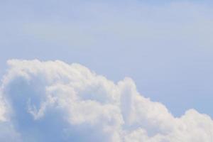 Clear blue sky and white clouds photo