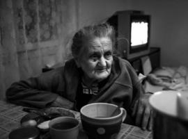 Old depressed woman. photo