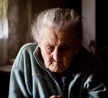 very old tired woman photo