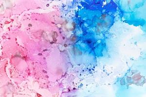 Blue pink and purple ink drops and splotches background photo