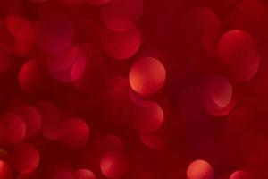 Abstract circular bokeh background of red color. Christmas and New Year concept. photo