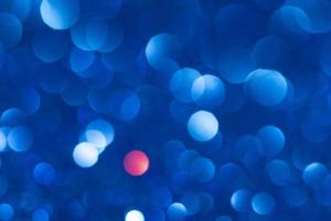 blue bokeh abstract light background. Christmas and New Year concept photo