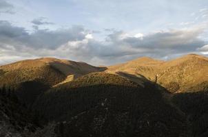 Rock mountain at sunset photo