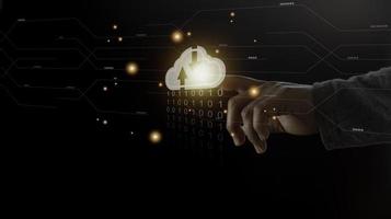 Cloud computing concept - connect to cloud. Businessman or information technologist with cloud computing icon. photo