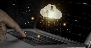Cloud computing concept - connect to cloud. Businessman or information technologist with cloud computing icon. photo
