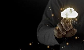 Cloud computing concept - connect to cloud. Businessman or information technologist with cloud computing icon. photo