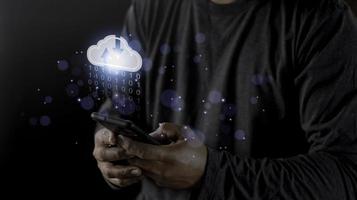 Cloud computing concept - connect to cloud. Businessman or information technologist click on cloud computing icon. photo