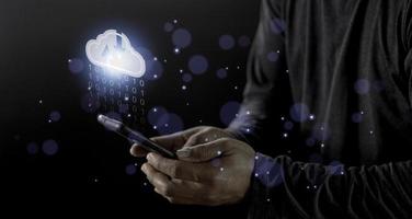 Cloud computing concept - connect to cloud. Businessman or information technologist click on cloud computing icon. photo
