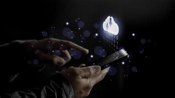 Cloud computing concept - connect to cloud. Businessman or information technologist click on cloud computing icon. photo