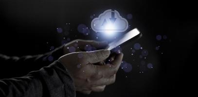 Cloud computing concept - connect to cloud. Businessman or information technologist click on cloud computing icon. photo