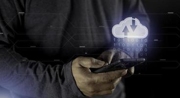 Cloud computing concept - connect to cloud. Businessman or information technologist click on cloud computing icon. photo