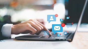 icon on laptop show notifications of new messages,internet application notification concept,Cyberspace Communications, Connected Inboxes, Chats, Messages, and Apps photo