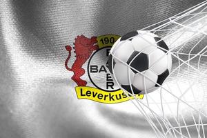 liga de campeones de la uefa 2023, bandera del bayer leverkusen con un balón de fútbol en la red, papel tapiz de la uefa, trabajo en 3d e imagen en 3d. erevan, armenia - 2023 enero 27 foto