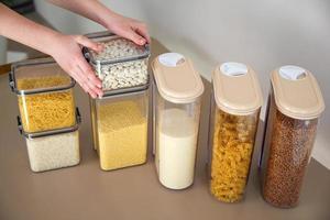 Containers for storing bulk products in the kitchen. photo