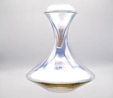 glass decanter on a white background, useful for decanting and oxygenating wine, in this case excellent Italian wine photo