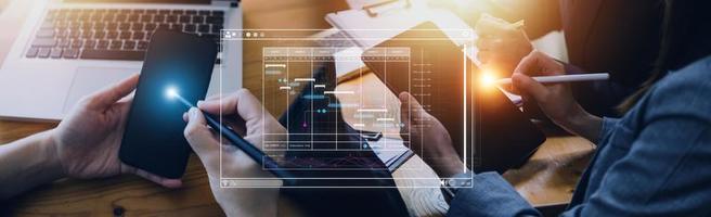 Analyst working with computer in Business Analytics and Data Management System to make report with KPI and metrics connected to database. Corporate strategy for finance, operations, sales, marketing photo