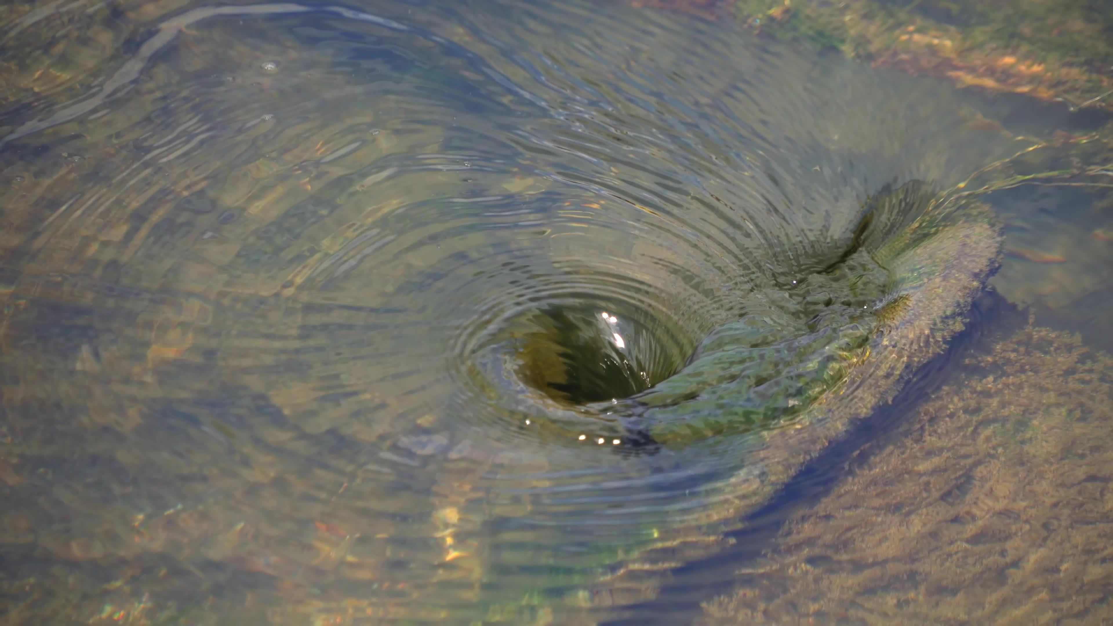 View of natural whirlpool in water. 18921831 Stock Video at Vecteezy