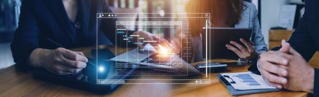 Analyst working with computer in Business Analytics and Data Management System to make report with KPI and metrics connected to database. Corporate strategy for finance, operations, sales, marketing photo