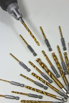 electric drill with a set of drill bits background photo