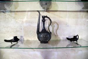 Dagestan.Russia.September 16 2022.Derbent.Ancient pre-Arab citadel Naryn-Kala.Museum.Interior exhibition.Jug and lams. photo