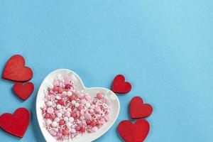 for Valentine's Day with sweets. cookies on a blue background. view from above. photo