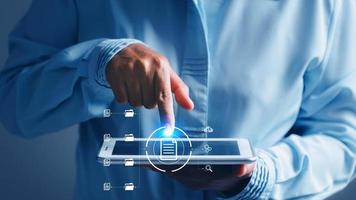 Online documentation database and process automation to efficiently manage files,  staff working with Document Management System DMS, Corporate business technology. Cognition on modern management. photo