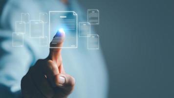 Online documentation database and process automation to efficiently manage files,  staff working with Document Management System DMS, Corporate business technology. Cognition on modern management. photo