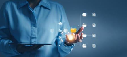 Online documentation database and process automation to efficiently manage files,  staff working with Document Management System DMS, Corporate business technology. Cognition on modern management. photo