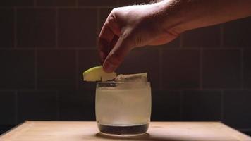 Garnishing a Cocktail with a Lime video