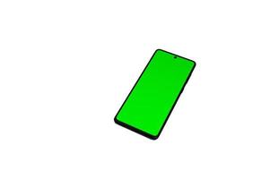 smartphone con pantalla verde, con trazado de recorte foto