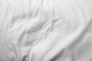 white bed linen gradient texture blurred curve style of abstract luxury fabric,Wrinkled bed linen and dark gray shadows,background photo