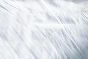 white bed linen gradient texture blurred curve style of abstract luxury fabric,Wrinkled bed linen and dark gray shadows,background photo